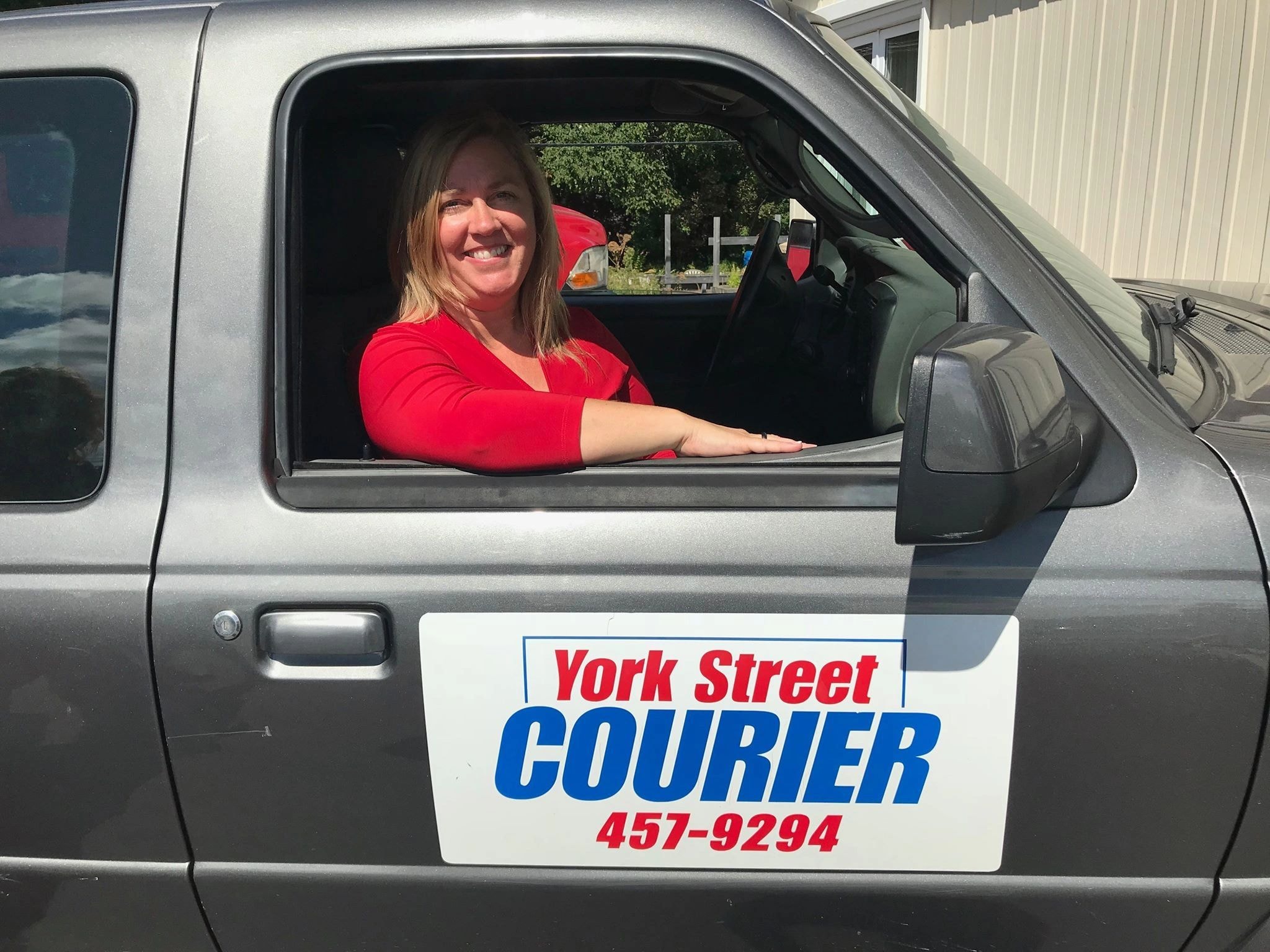 York Street Courier team member — contains baked-in text